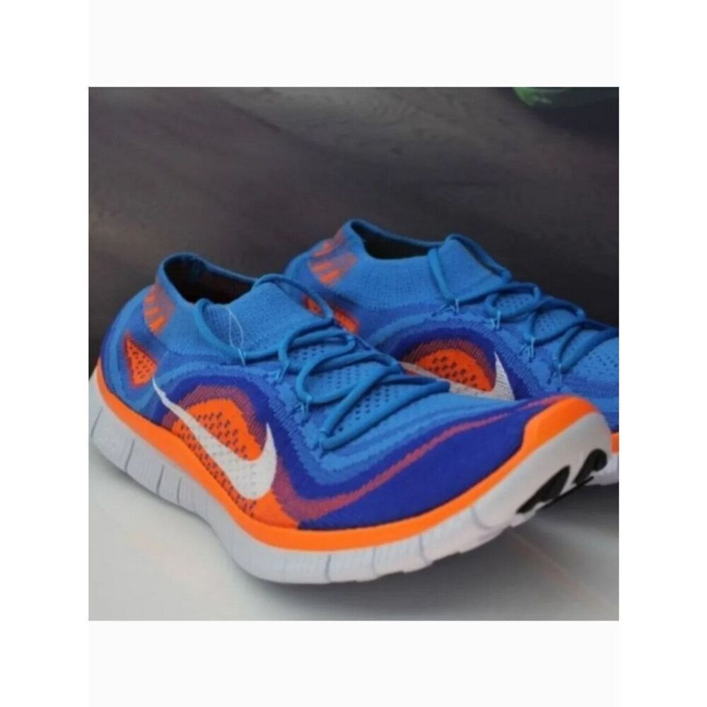 New in Box Nike Flyknit + Blue Glow Total Orange Mens 9.5 US 43 EUR RARE